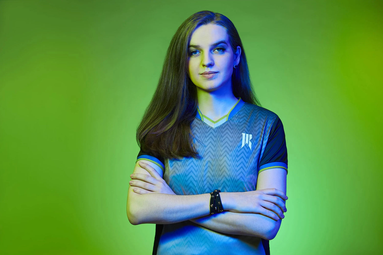 Player (Scarlett) with a Rebellion jersey and a green background