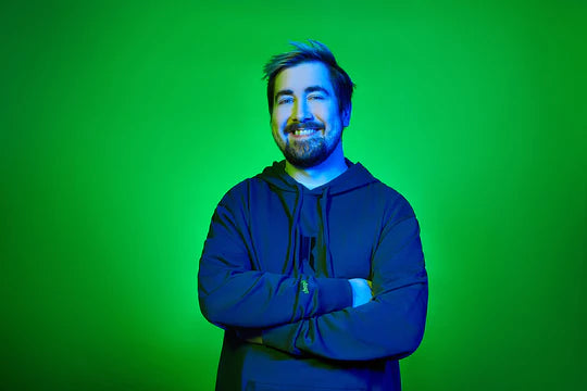 Player (Zizaran) with a Rebellion hoodie and a green background